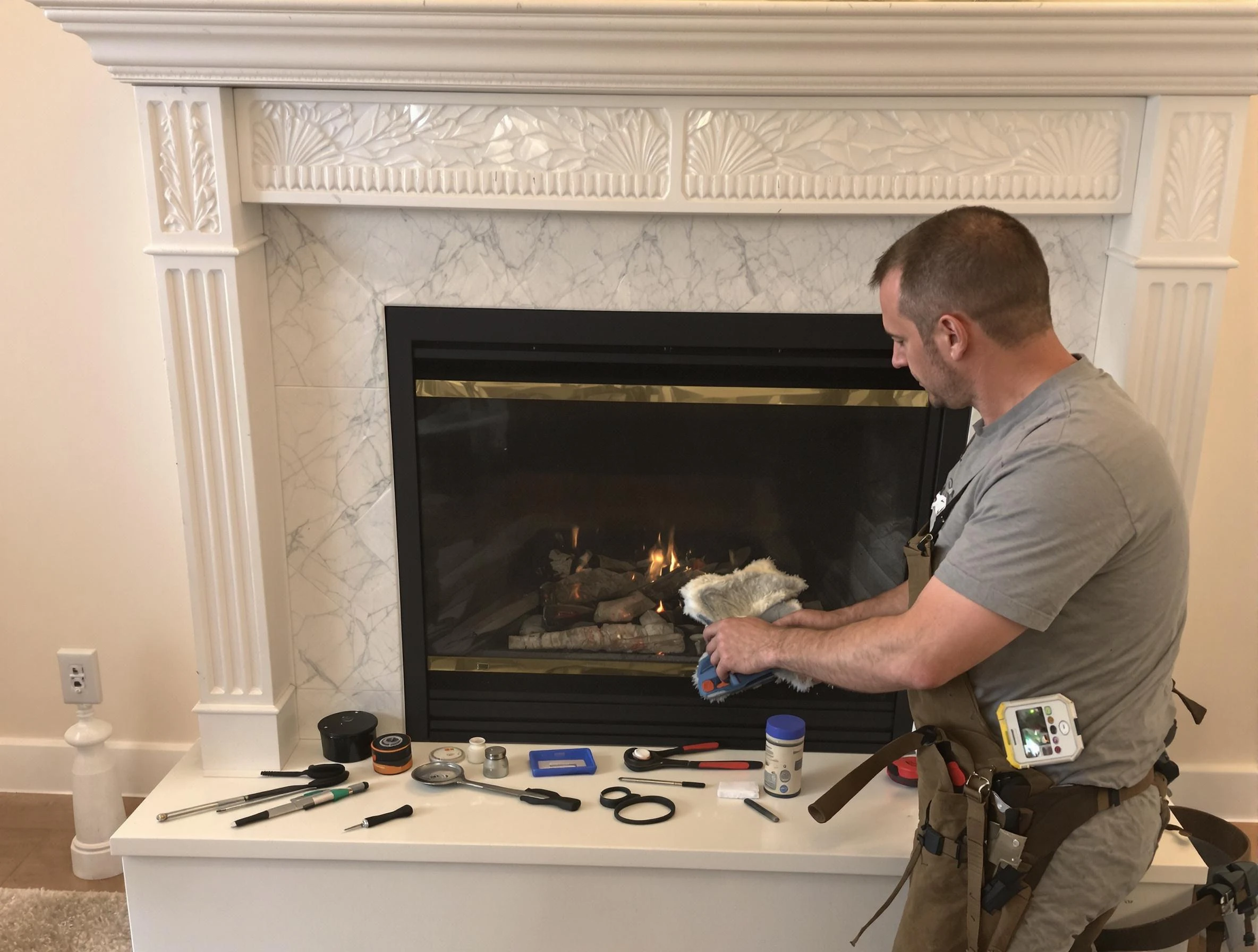 Norcross Chimney Sweep performing fireplace maintenance in Norcross, GA